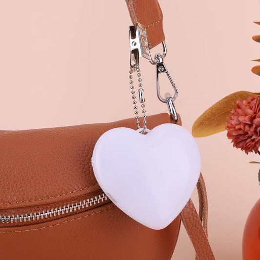 GlowHeart – Mini LED Handbag Light with Sensor